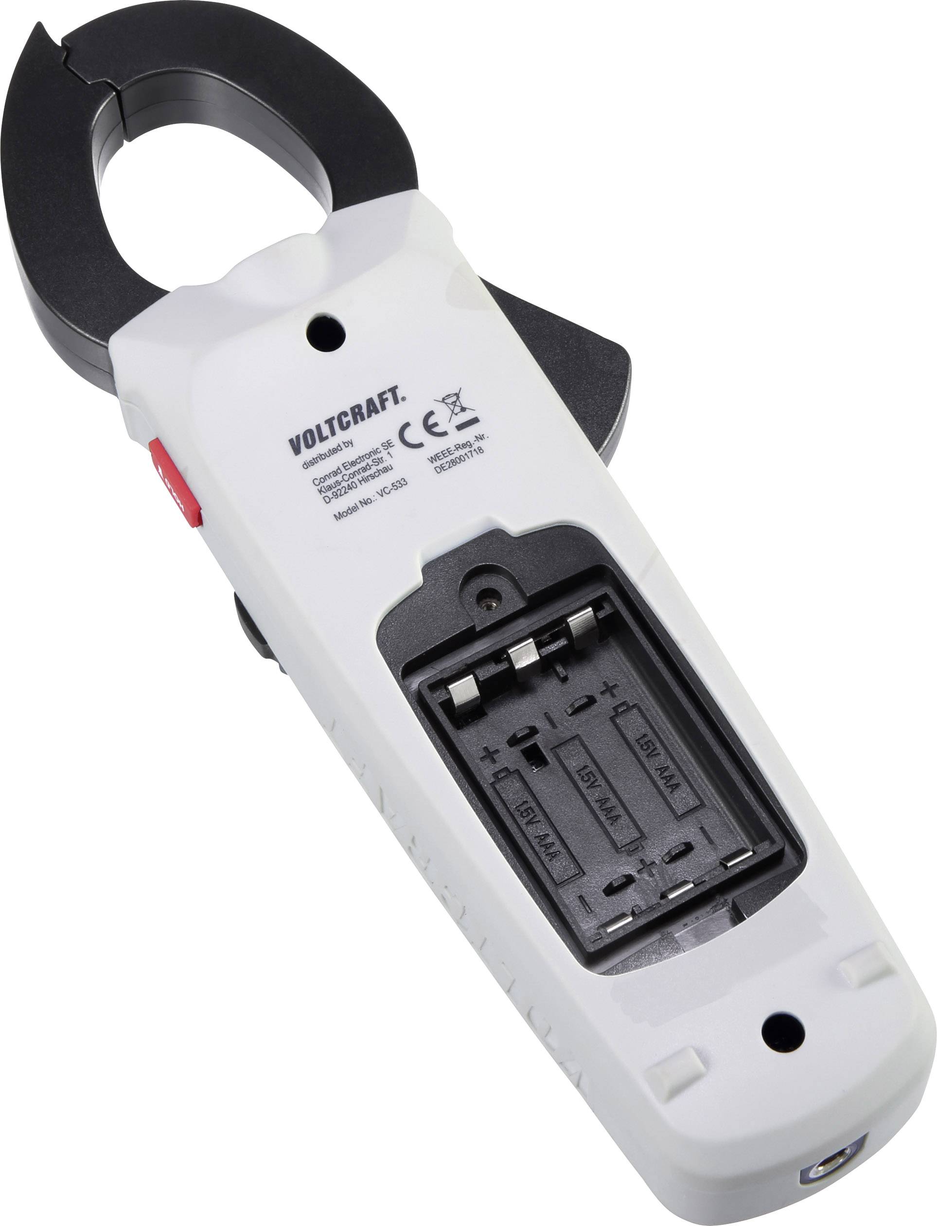 Weißes Voltmeter mit offener Rückseite und sichtbarem Batteriefach. Markierung mit CE-Zeichen und Nummern auf der Rückseite.