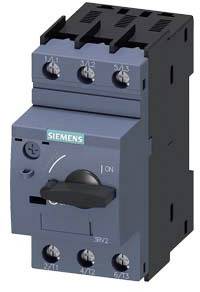 Ein grauer elektrischer Schalter von Siemens mit sechs Anschlüssen und einem Drehknopf in der Mitte, markiert mit 'ON'.