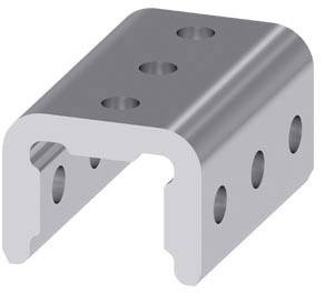 Metallklotz in U-Form mit mehreren runden Löchern auf der Ober- und Seitenfläche, vermutlich ein technisches Bauteil.