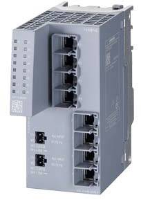 Graues elektronisches Gerät mit mehreren Steckplätzen und Anschlüssen, möglicherweise ein Netzwerk- oder Kommunikationsmodul.