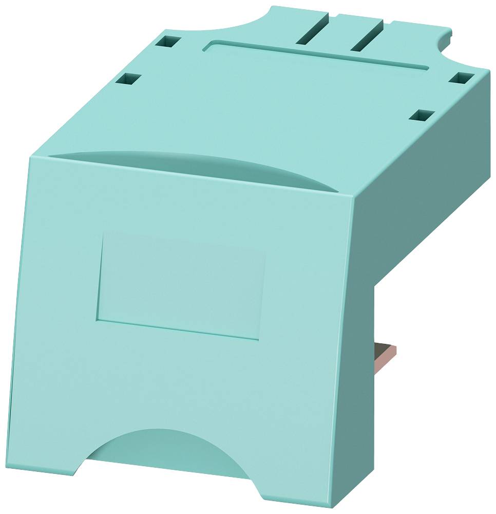 Grünes, eckiges Bauteil mit Aussparungen, möglicherweise ein elektrisches Steckmodul.
