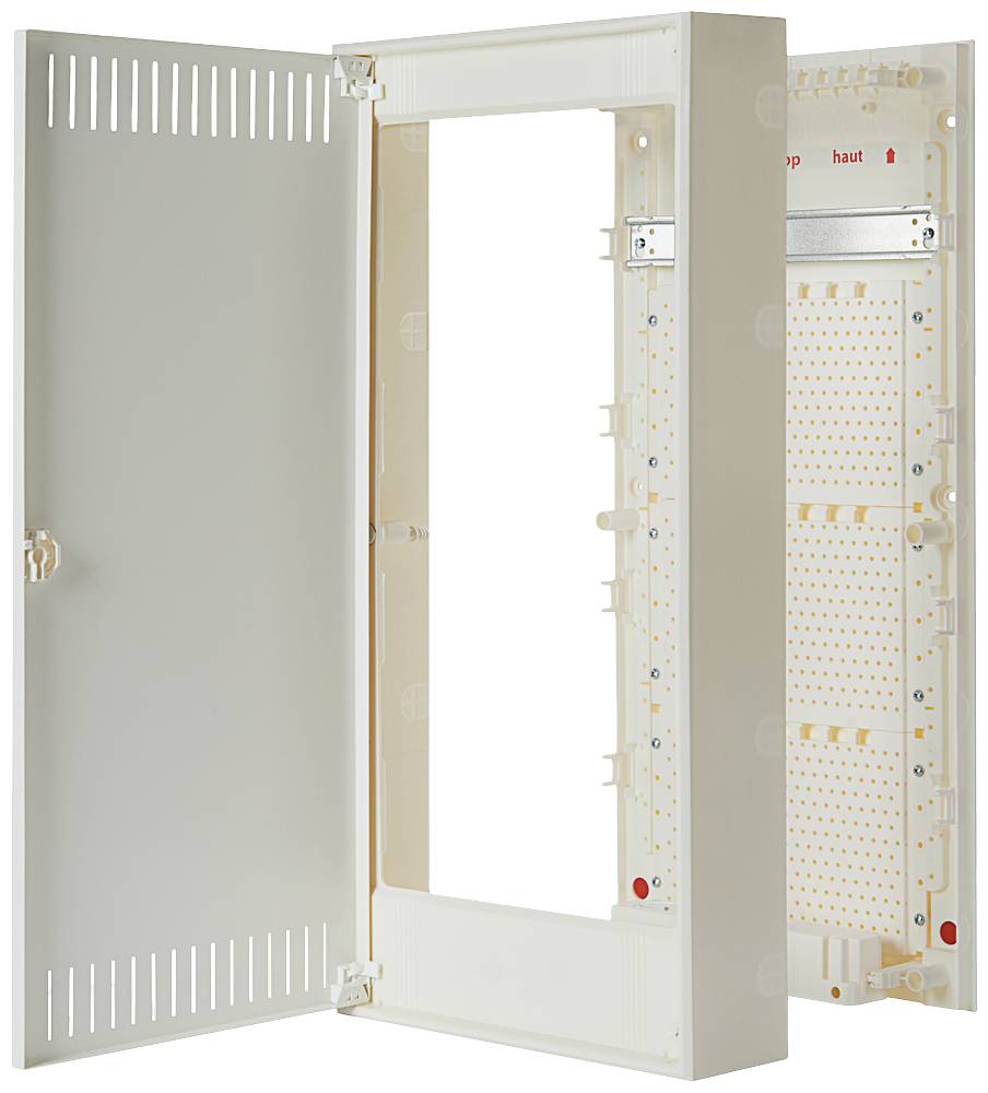 Geöffneter weißer Schaltschrank mit sichtbarem Innenraum. Links ist die Tür, rechts sind Steckplätze für Elektrokomponenten sichtbar.