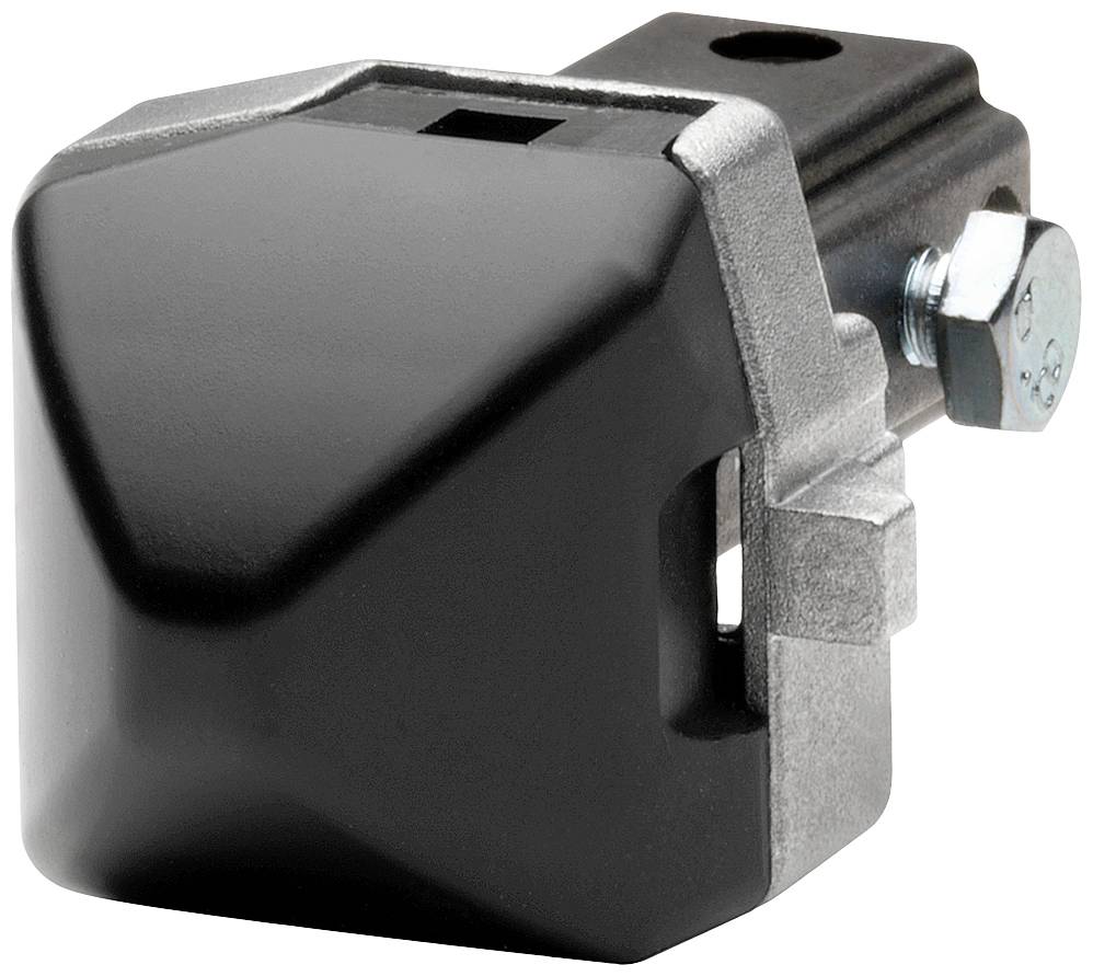 Ein schwarzes, eckiges Gerät mit Metallhalterung und Schraube, vermutlich Teil eines größeren mechanischen Systems oder Gehäuses.