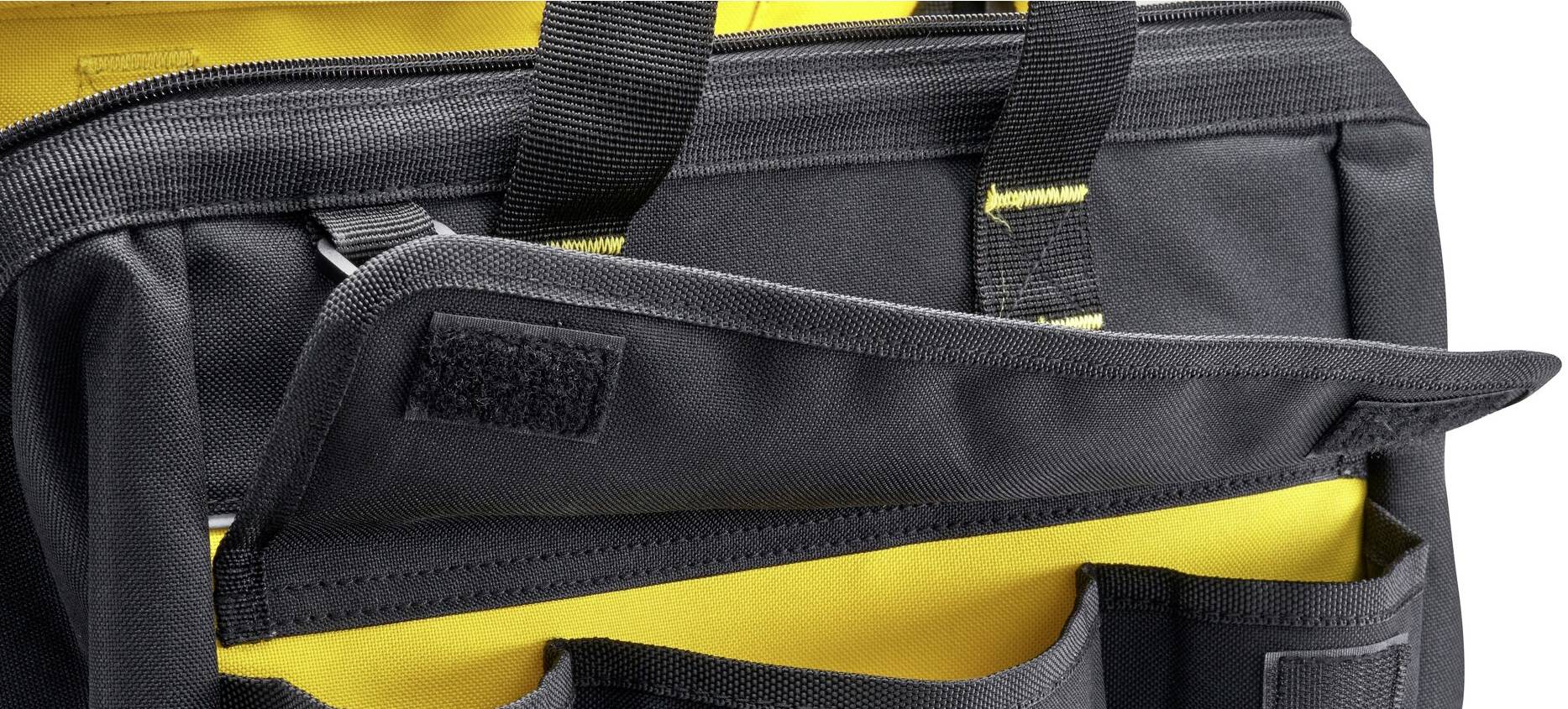 Eine schwarze Tasche mit gelbem Innenfutter und mehreren Fächern wird gezeigt. Die Tasche hat schwarze Tragegriffe und Klettverschlüsse.