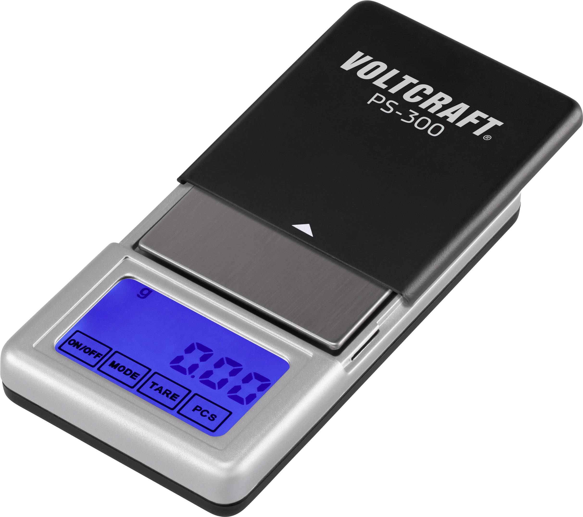 Digitale Waage mit blau beleuchtetem Display, zeigt '0.00 g'. Markenname 'Voltcraft PS-300' oben auf der Waage.