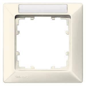 Beige Siemens Schalterrahmen mit quadratischer Aussparung für Einsätze; oben ein kleiner rechteckiger Lichtstreifen.