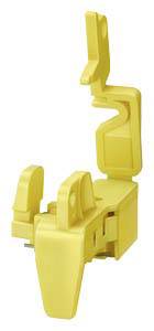 Gelbes Kunststoffteil, das als Sicherheitsschalter-Abdeckung dient. Es verhindert unbeabsichtigtes Einschalten von Maschinen.