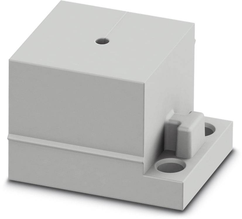 Ein graues, quaderförmiges elektronisches Bauteil mit zwei Befestigungslöchern und einer kleinen Erhöhung an der Seite.