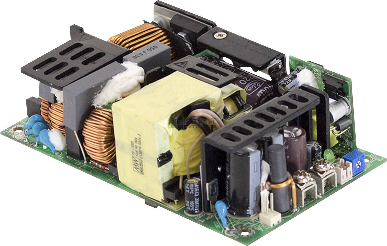 Abgebildet ist eine elektronische Schaltung mit Kondensatoren und Spulen auf einer grünen Leiterplatte.