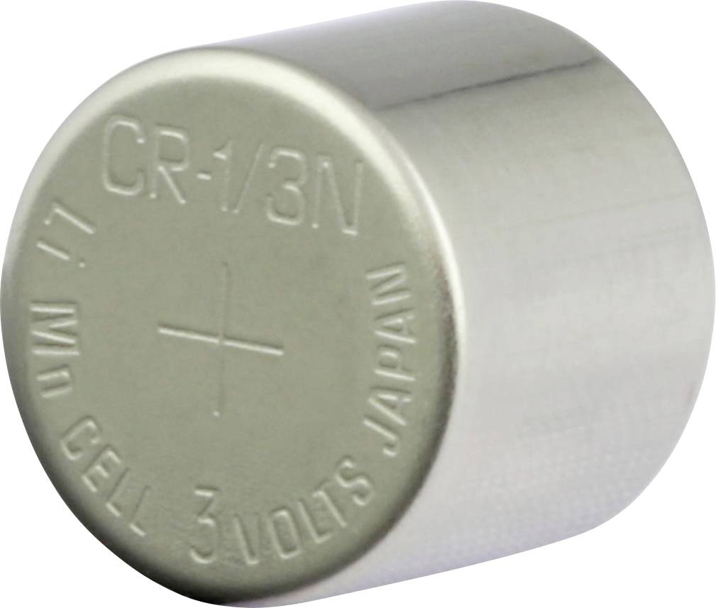 Silberne CR-1/3N-Knopfzelle mit Pluspol-Markierung und Aufdruck '3 VOLTS'