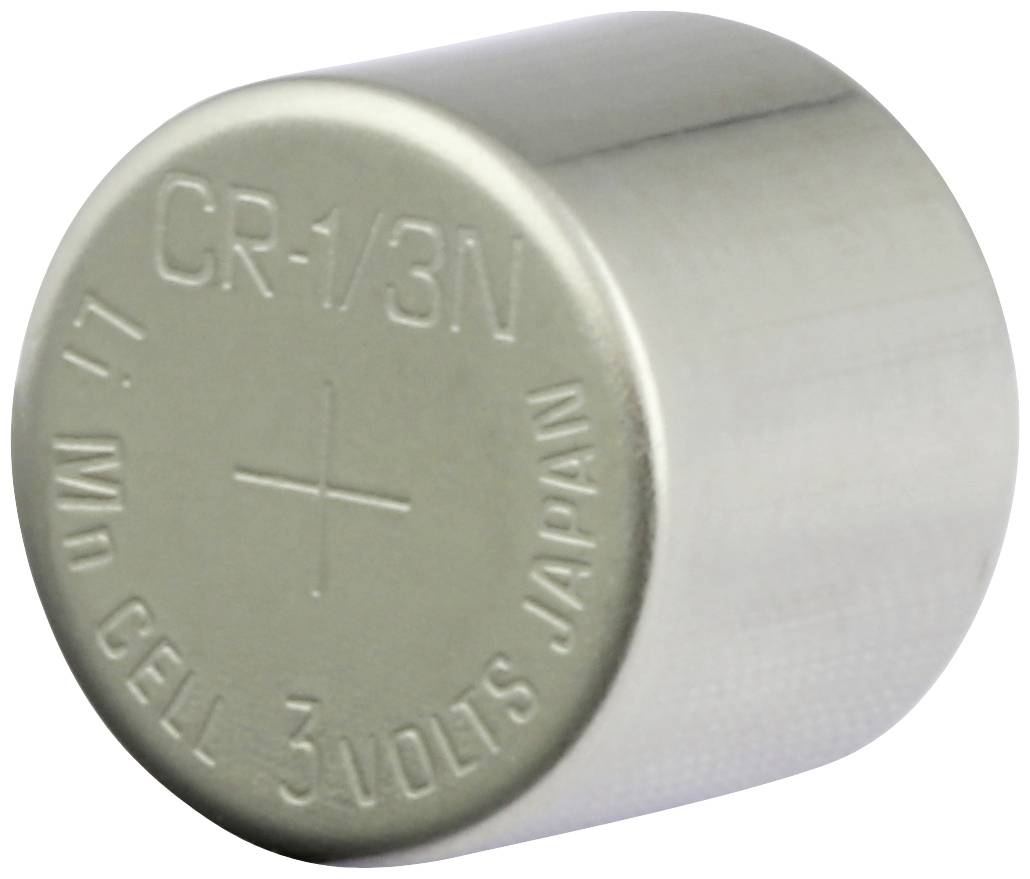 Zylindrische CR-1/3N Lithium-Batterie mit Aufschrift 'CR-1/3N Li-MO CELL 3 VOLTS JAPAN', silberfarben, 3 Volt Spannung.