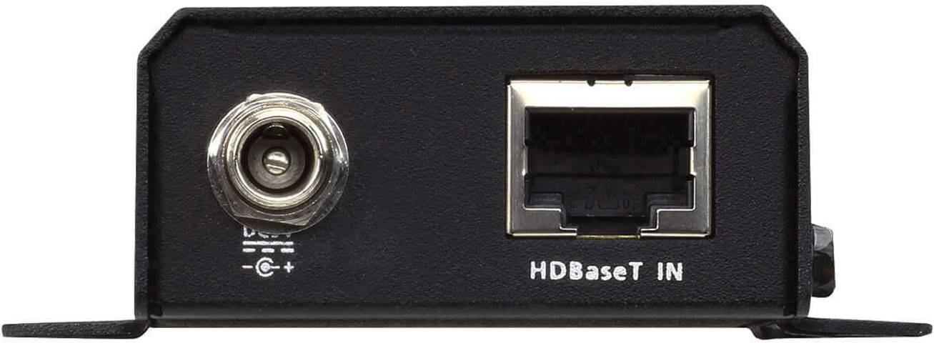Ein schwarzes Gerät mit einem koaxialen Anschluss links und einem HDBaseT-IN-Anschluss rechts.