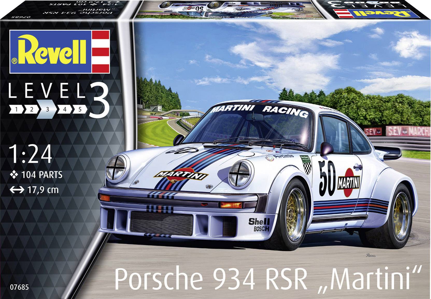 Modellbausatz-Verpackung eines Porsche 934 RSR mit 'Martini'-Rennlackierung. Zeigt das fertige Modell auf einer Rennstrecke.