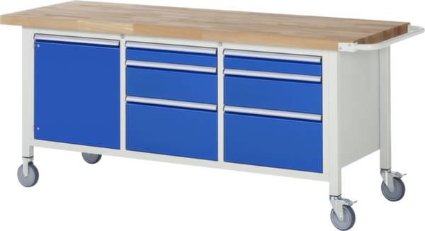 Eine Werkbank auf Rollen mit blauer Schubladenfront und Holzarbeitsplatte.