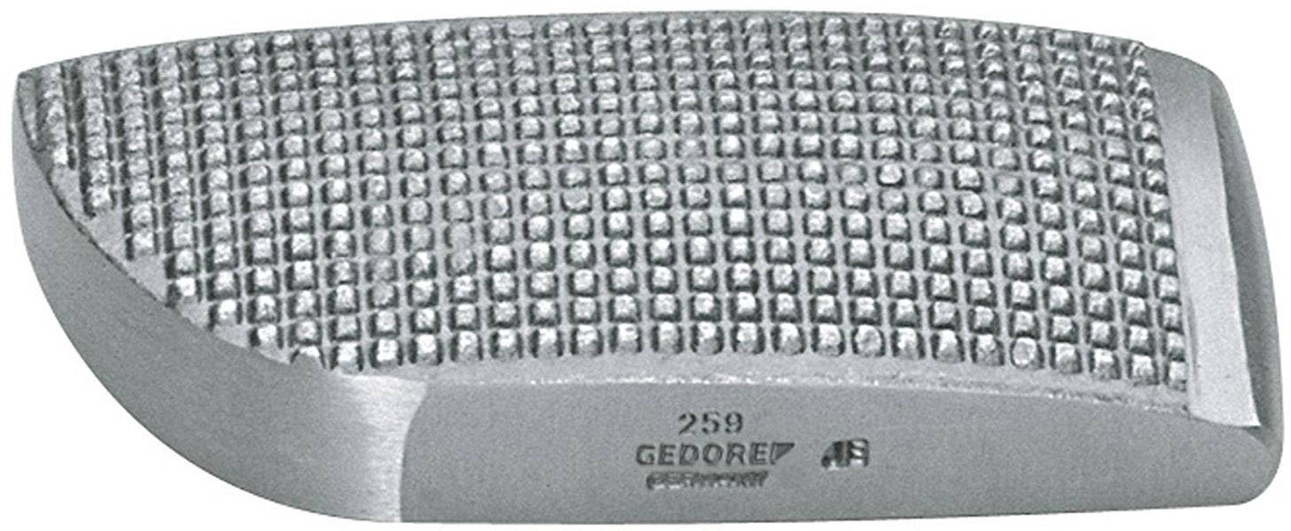 Ein silberner Metallkeil mit geriffelter Oberfläche und der Gravur '259 GEDORE' unten.