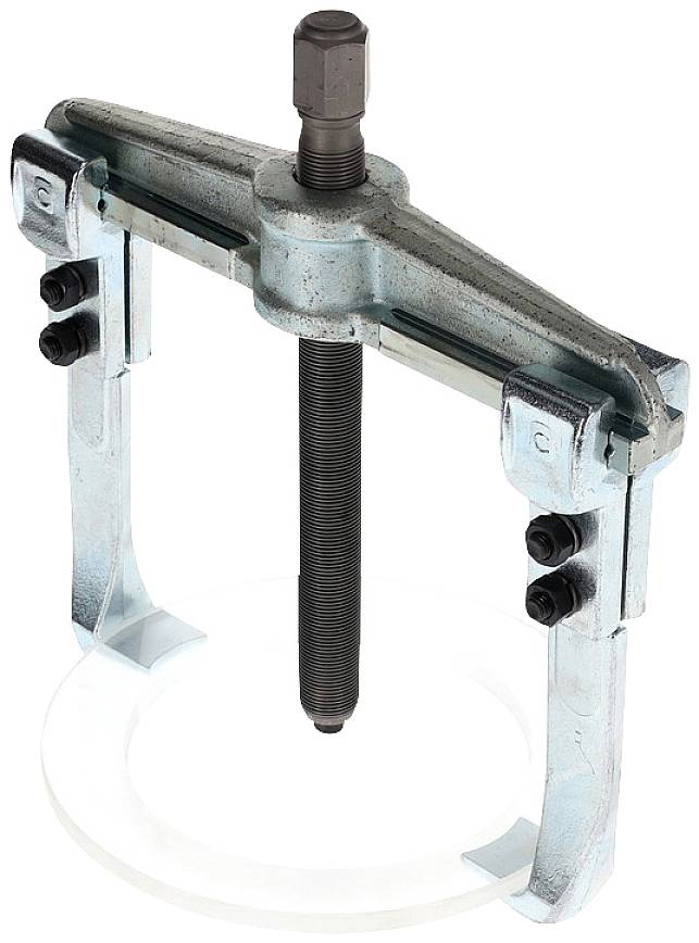 Ein silberfarbener Abzieher mit zwei Armen und einer zentralen Schraube, verwendet zum Abziehen festsitzender Teile von Wellen.