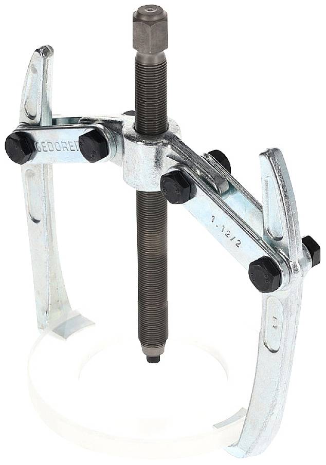 Ein dreibeiniger Abzieher aus Metall, mit mehreren Schrauben befestigt, dient zum Lösen von festsitzenden Teilen auf einer Welle.