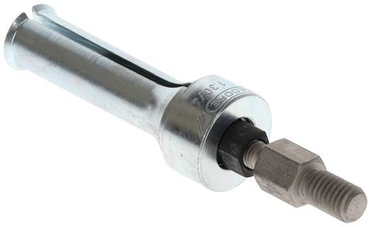 Ein silberner Metall-Dübel, der zum Befestigen von Teilen an Wänden verwendet wird, liegt auf weißem Hintergrund.