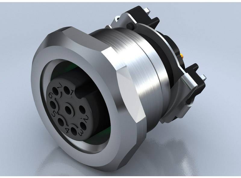 Ein metallisches, zylindrisches Bauteil mit mehreren Bohrungen und Anschlüssen, vermutlich ein mechanisches oder elektrisches Verbindungselement.