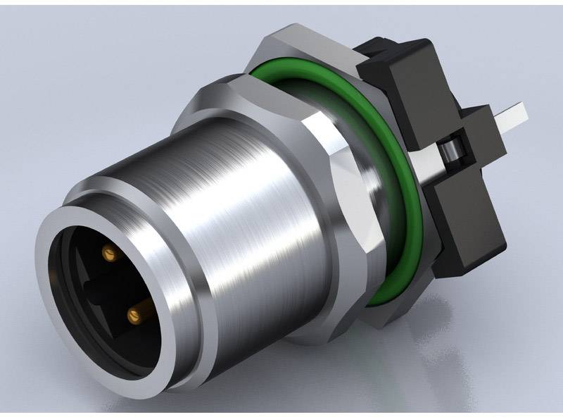 Metallischer Steckeranschluss mit grünem Dichtungsring und schwarzem Kunststoffteil, auf einer grauen Oberfläche liegend.