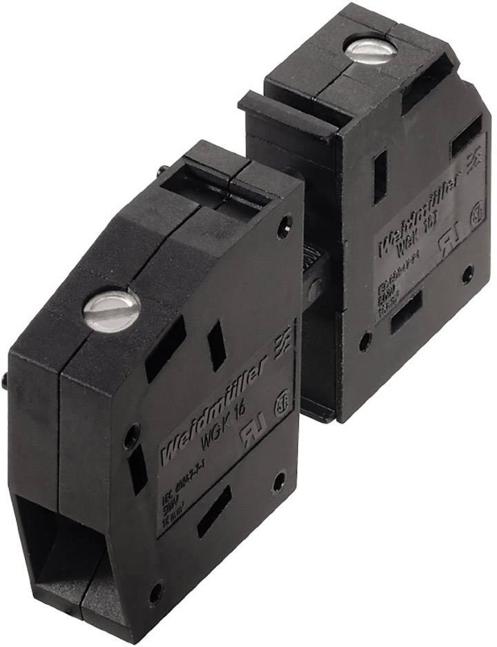 Zwei schwarze Überspannungsschutzgeräte mit Schrauben oben auf jeder Einheit. Geeignet für den Schutz elektrischer Systeme.
