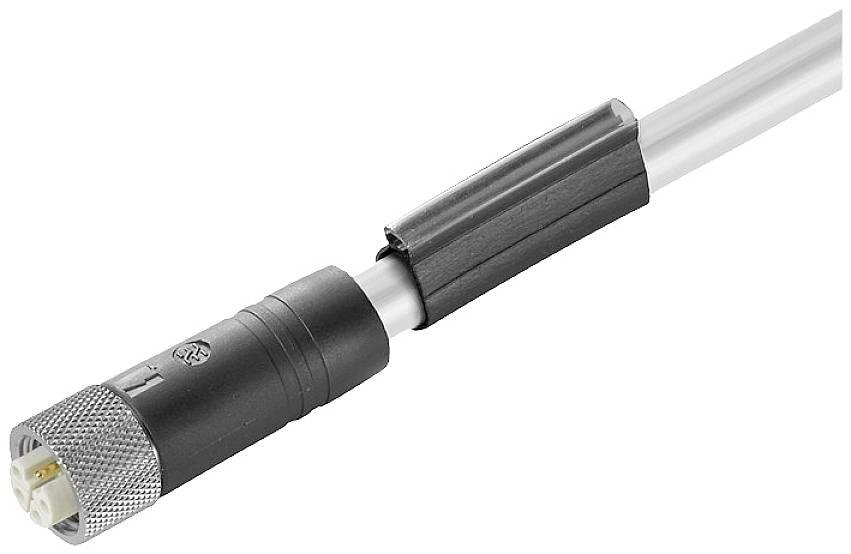 Ein silberner und schwarzer elektrischer Stecker an einem Kabel, möglicherweise für Audiogeräte.