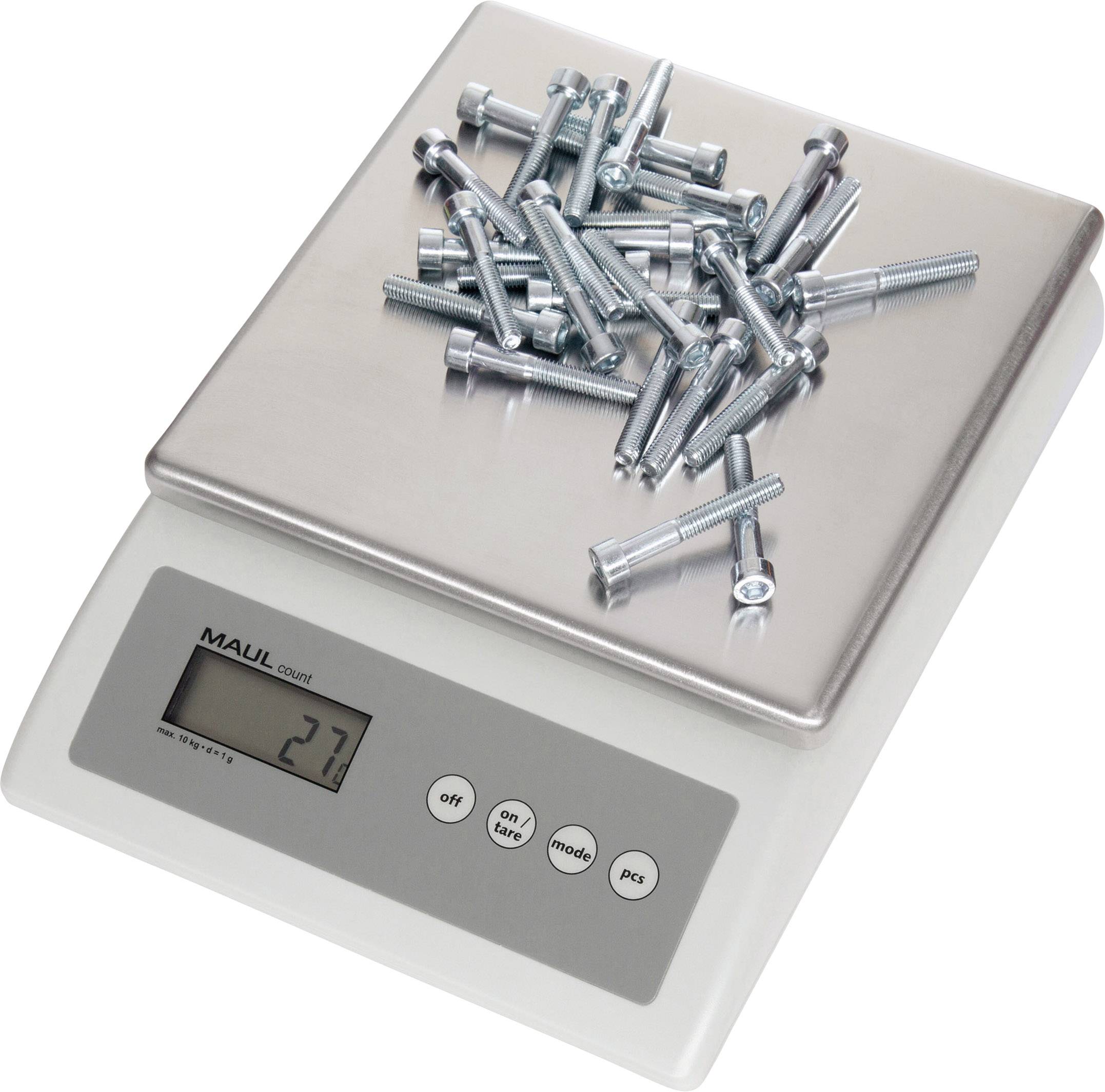 Ein digitaler Küchenwaage zeigt ein Gewicht von 27 Gramm. Auf der Waage liegt ein Haufen Metallbolzen und -schrauben.