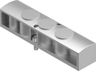 Ein silbernes Metallteil, bestehend aus einem rechteckigen Block mit runden Erhebungen oben und mehreren zylindrischen Elementen darunter.