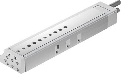 Lineare Antriebseinheit aus Metall mit mehreren Befestigungspunkten und zwei Anschlussstutzen, typischerweise für industrielle Anwendungen.