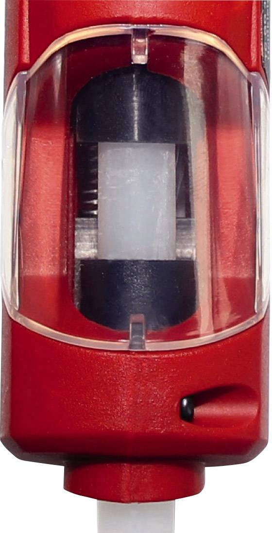 Ein rotes, röhrenförmiges Gerät mit transparenter Front und einem zentralen, schwarzen Mechanismus.