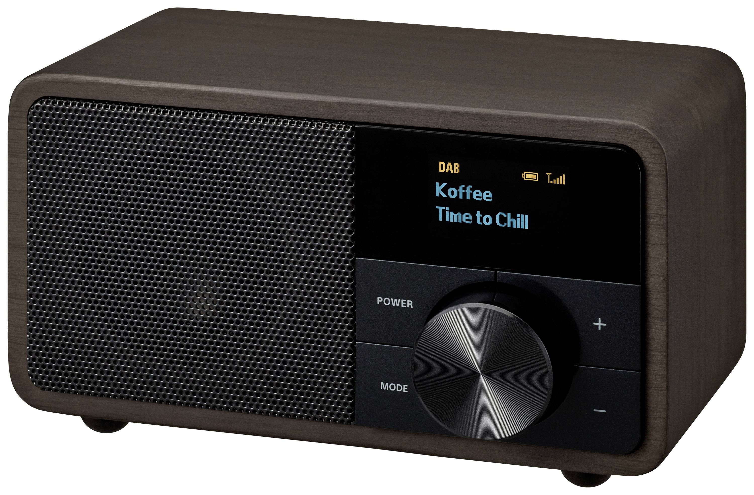 Ein Tischradio mit Holzgehäuse und digitalem Display, auf dem 'Koffee - Time to Chill' steht. Steuerknöpfe befinden sich darunter.