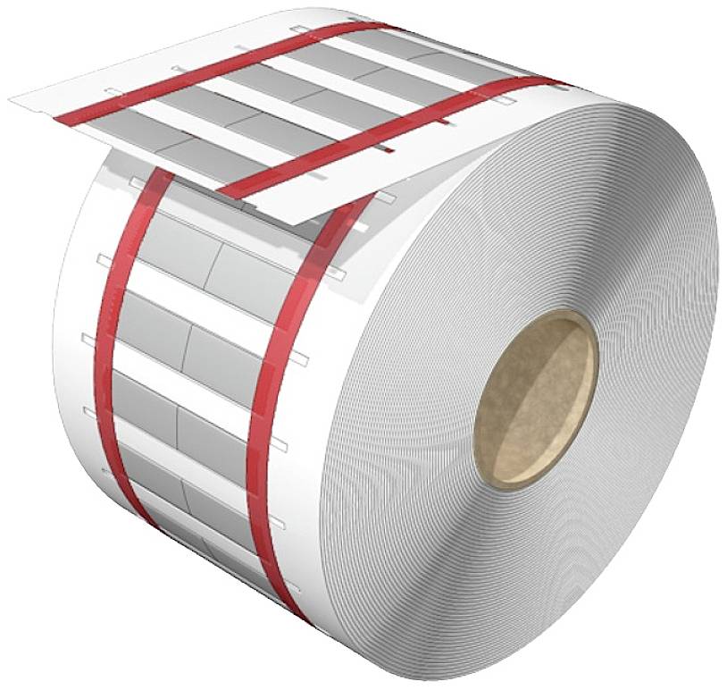 Eine große Rolle aus weißem Papier oder Kunststoff mit roten Markierungen und silbernen rechteckigen Flächen.