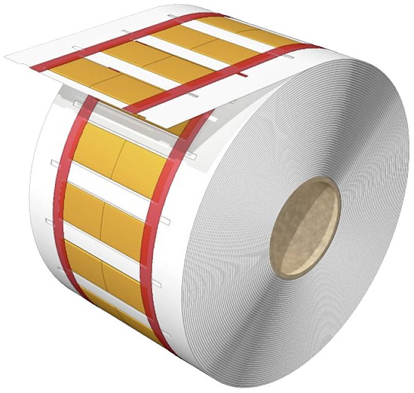 Große Rolle bedruckter gelber Etiketten auf einem weißen Papierträger, bereit für den industriellen Gebrauch.