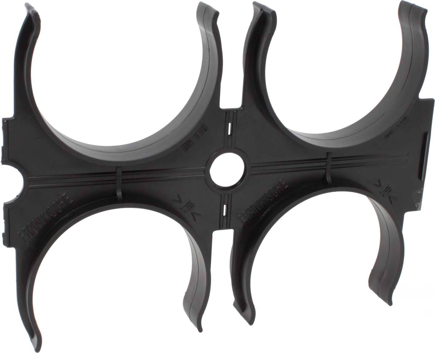 Ein Kunststoffhalter mit vier rundlichen Öffnungen zur Befestigung von Rohren oder Kabeln, aus der Draufsicht gezeigt.