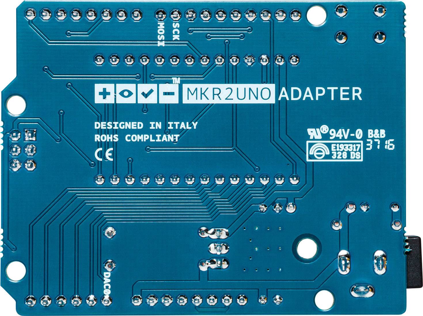 Rückseite eines Arduino MKR2UNO Adapterboards, zeigt elektrische Layouts und Anschlüsse. Designed in Italy, ROHS Compliant.