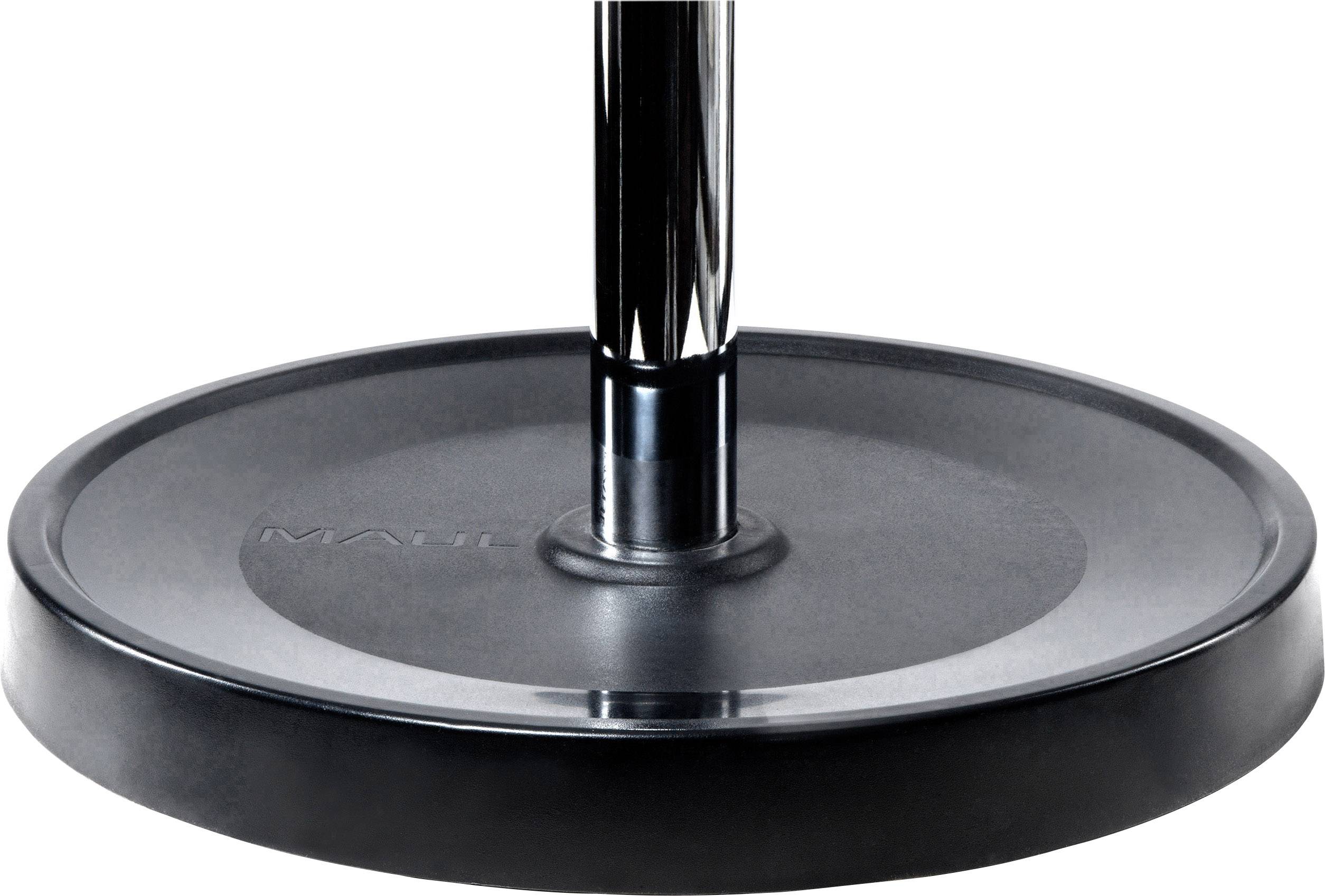 Runder schwarzer Sockel eines Ständers mit einem senkrechten Metallrohr in der Mitte.