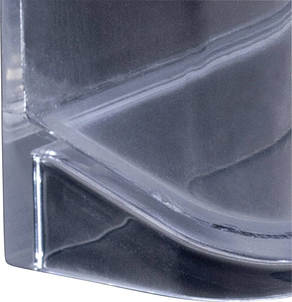 Unregelmäßige transparente Glasstruktur mit geschwungenen Linien und Lichtreflexionen.