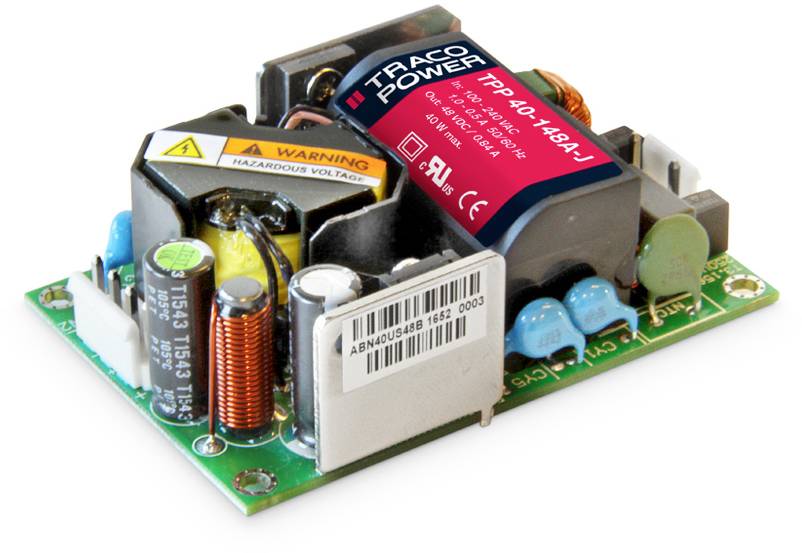 Elektronisches Netzteilmodul mit Aufschrift 'TRACO POWER'. Komponenten und Warnhinweise sichtbar.用于电气和电子应用。