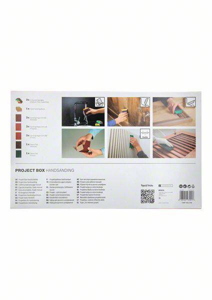 Die Rückseite einer Schleifpapier-Projektbox zeigt Anweisungen und bebilderte Schritte zur Handhabung von Schleifarbeiten.