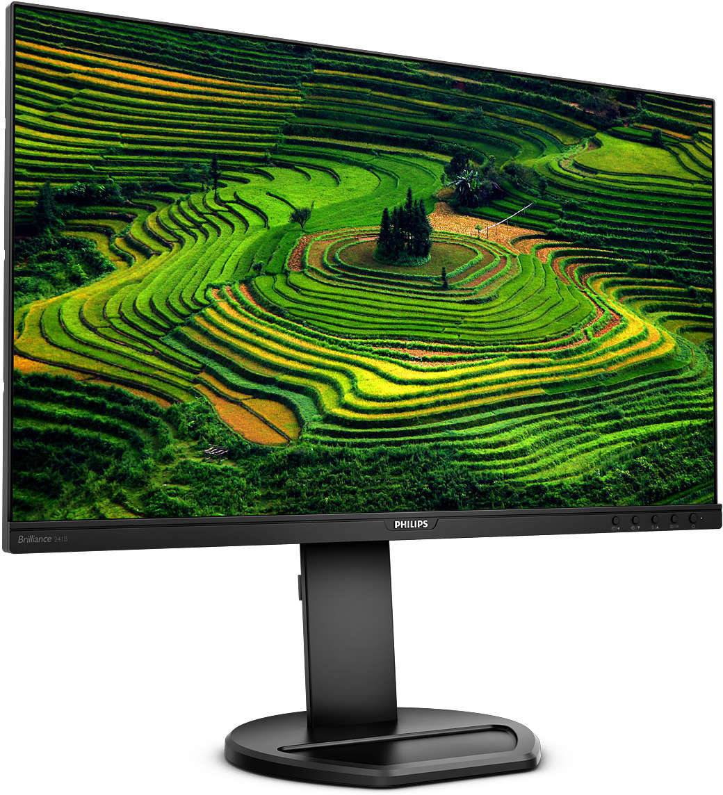 Ein Computermonitor zeigt ein Foto von leuchtend grünen Reisterrassen, die sich über Hügel erstrecken, unter klarem Himmel.
