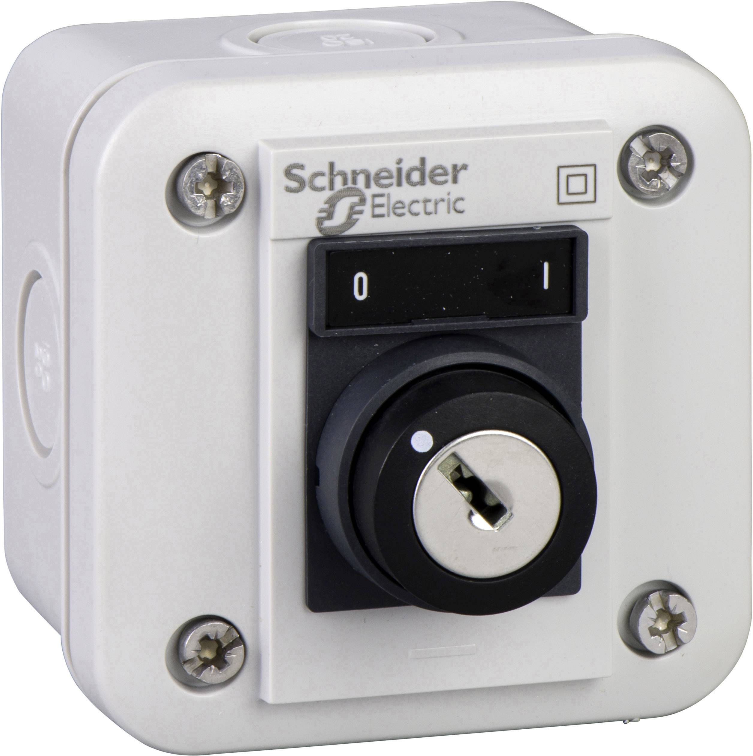 Ein quadratischer Schaltschrank mit einem runden Schlüsselschalter in der Mitte. Markiert mit 'Schneider Electric'.
