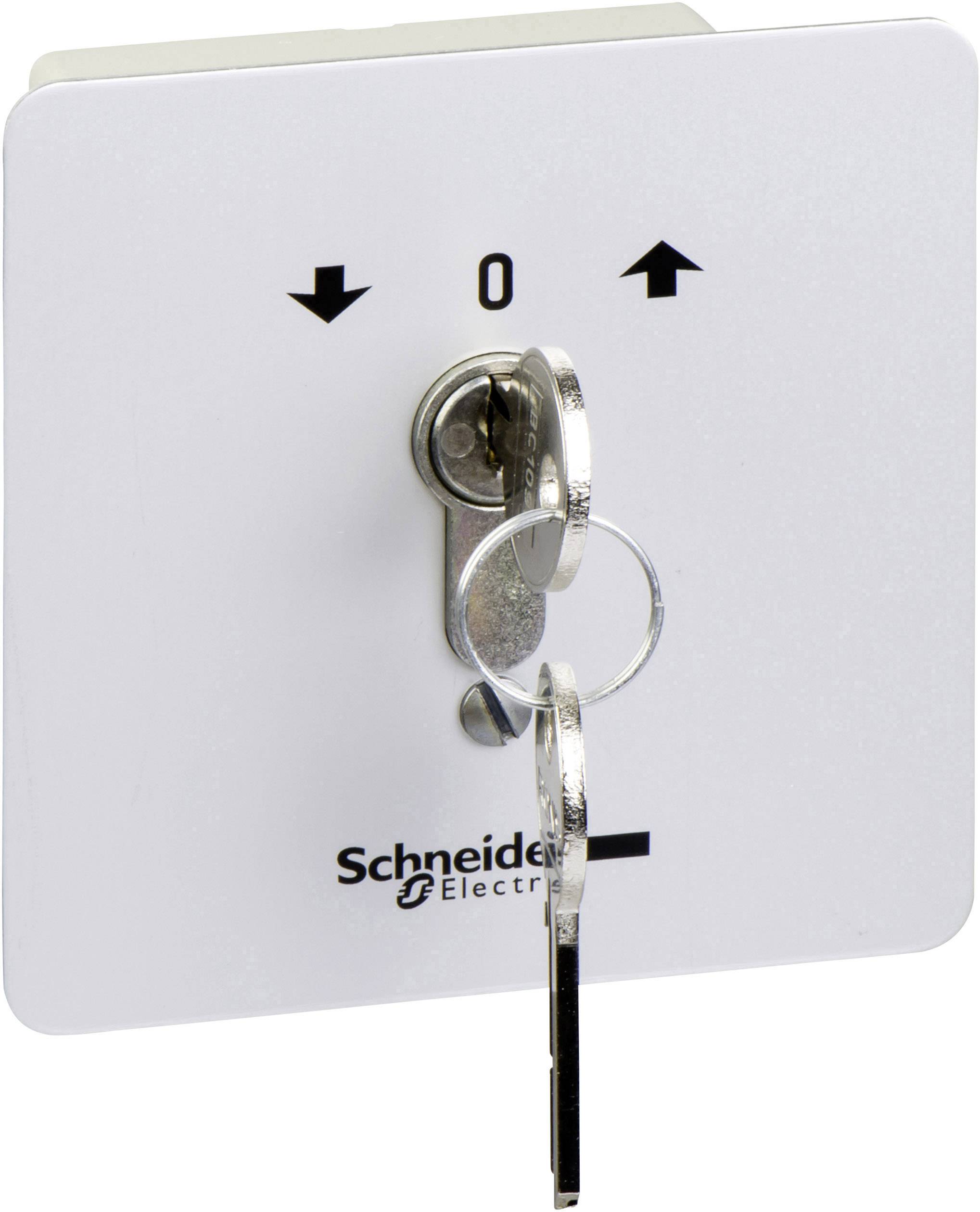 Schlüsselschalter von Schneider Electric in der '0'-Position mit eingesetztem Schlüssel. Pfeile zeigen Richtungen an.