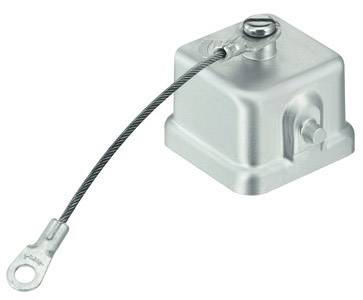 Metallische Schutzkappe mit Kabelbefestigung, verwendet für industrielle oder mechanische Anwendungen zum Schutz von Anschlüssen.