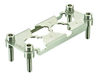 Metallplatte mit vier Schrauben und nummerierten Aussparungen für elektronische Bauteile.