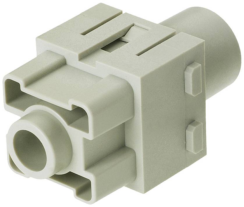 Ein graues, rechteckiges Kunststoffbauteil mit mehreren Steckverbindungen und Aussparungen, möglicherweise ein Stecker oder Adapter.