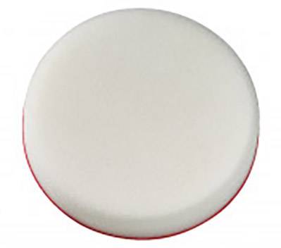 Ein runder, cremeweißer Schwamm mit glatter Oberfläche und rotem Rand, der als Reinigungswerkzeug verwendet wird.