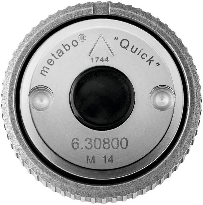Metallisches Objekt mit genoppter Struktur und einer zentralen Vertiefung, ähnlich einem mechanischen Teil oder Kameraobjektiv.