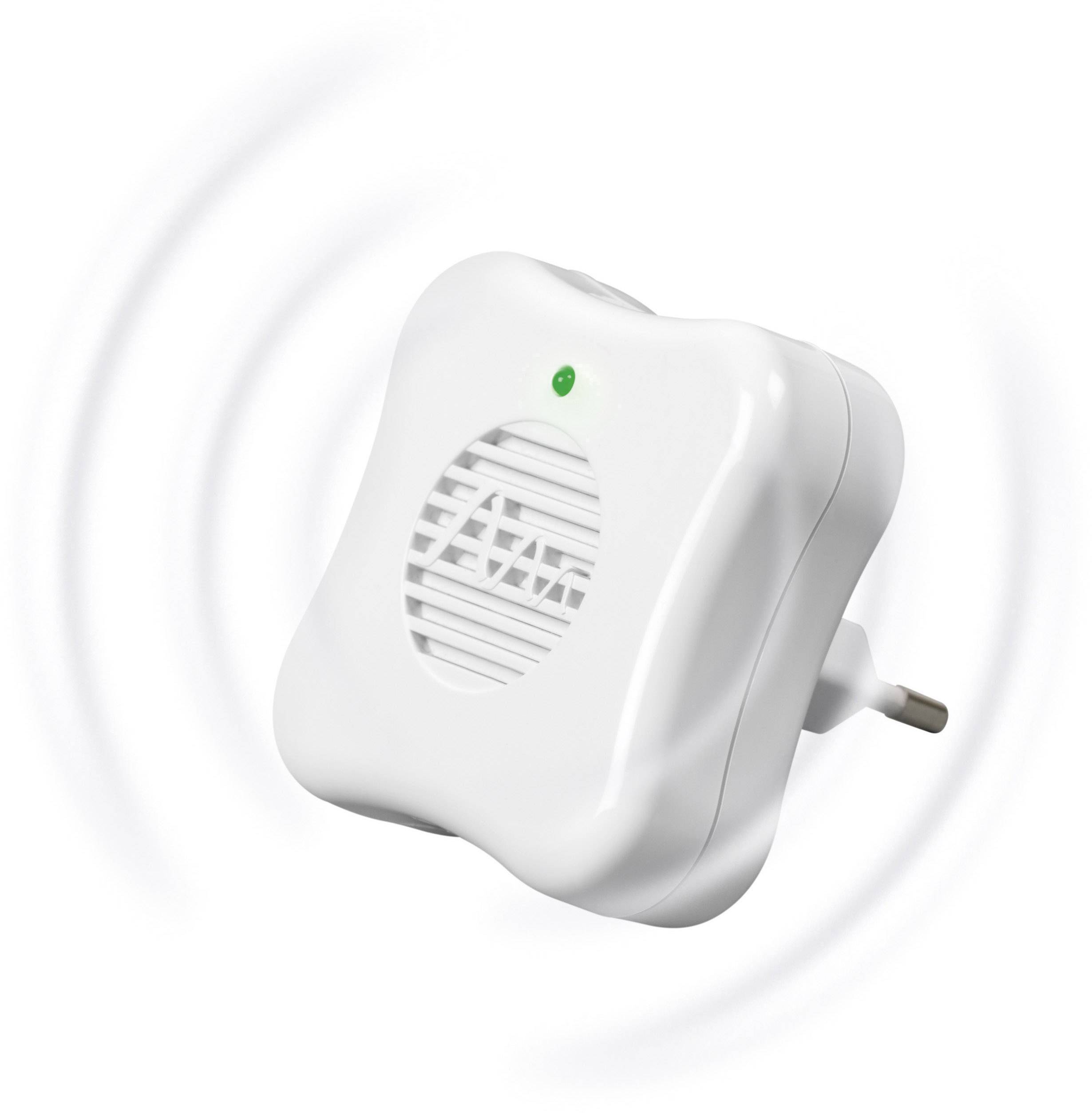 Ein weißer elektronischer Stecker mit eingebautem Lautsprecher und grünem Indikatorlicht, der an der Wand angebracht ist.