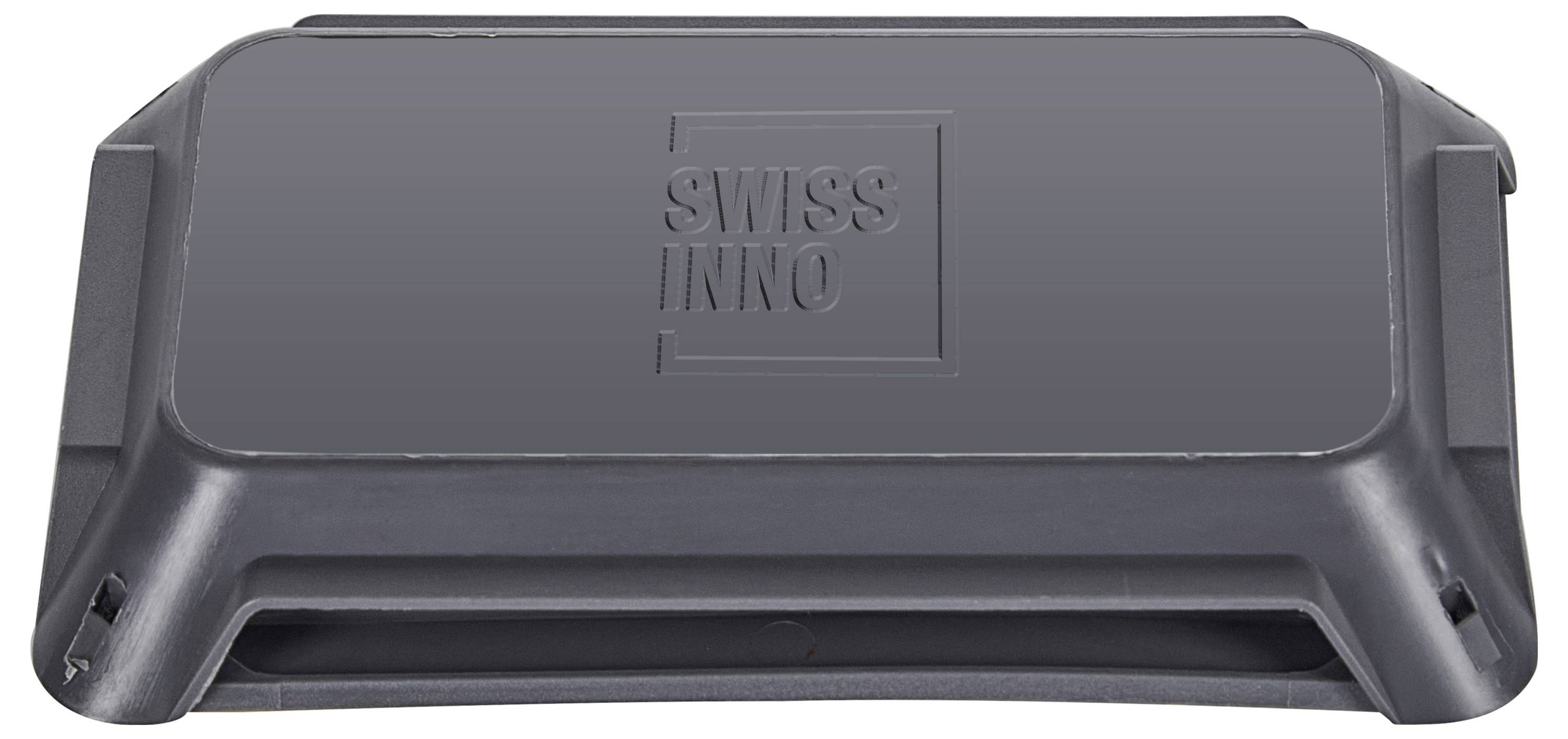 Eine rechteckige schwarze Kunststoffbox mit einem Aufdruck von 'SWISS INNO' auf der Oberseite. Die Box scheint eine Schutzumhüllung oder -abdeckung zu sein.