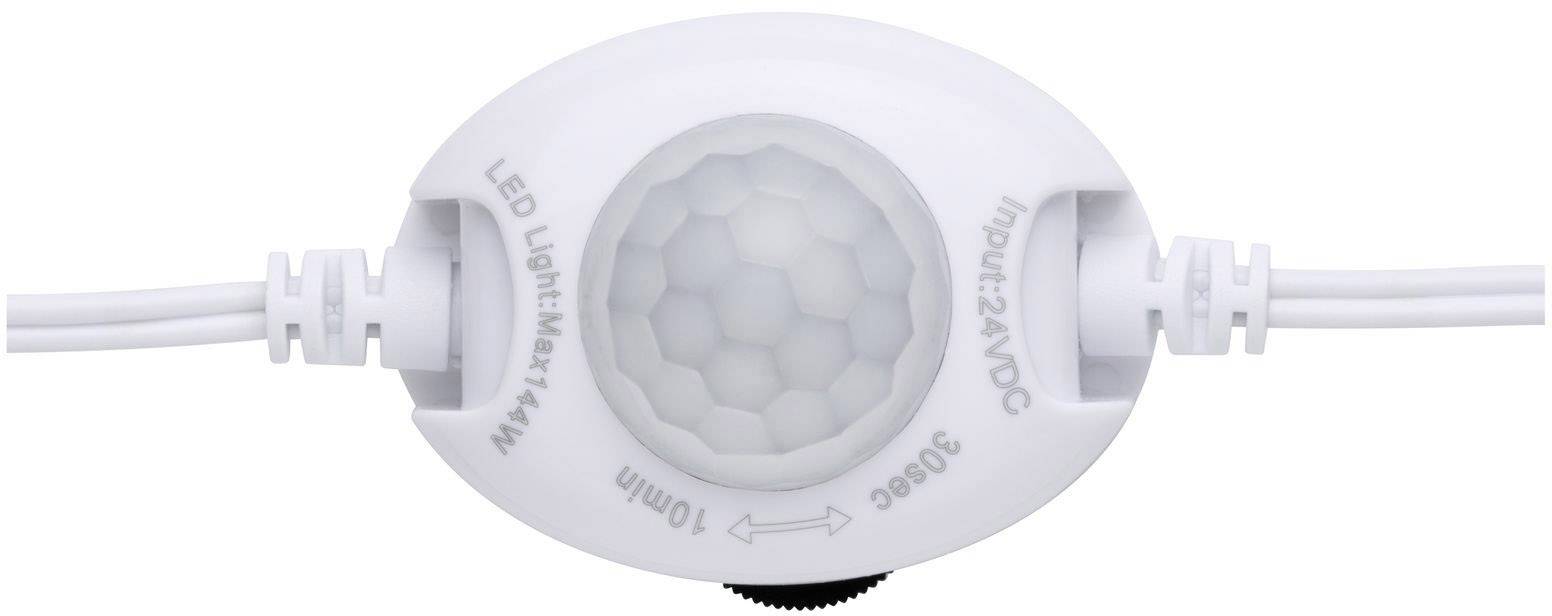 Ein weißer LED-Bewegungssensor mit Beschriftung 'LED Light Max 144W Input: 24VDC 360°C'.